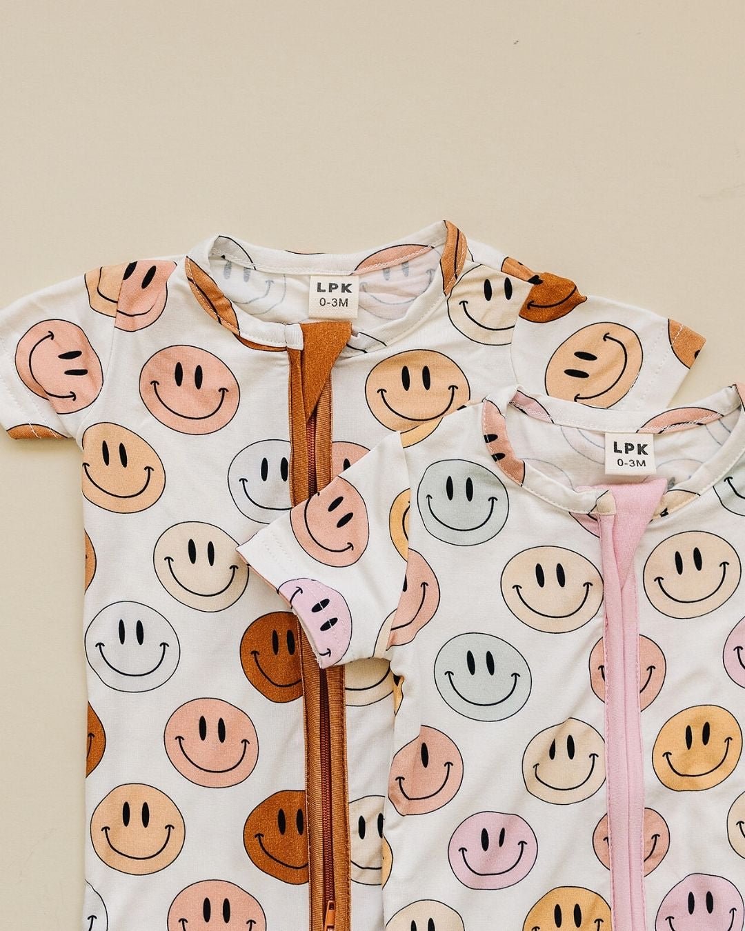 Bamboo Short Romper in Pink with an Adorable Smiley Print