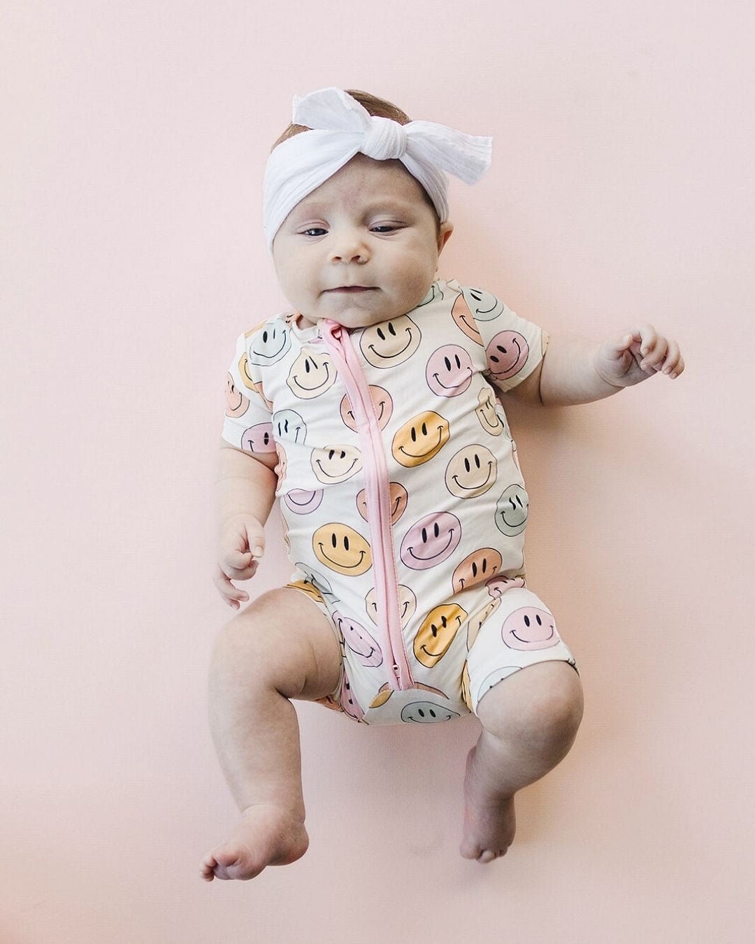 Bamboo Short Romper in Pink with an Adorable Smiley Print