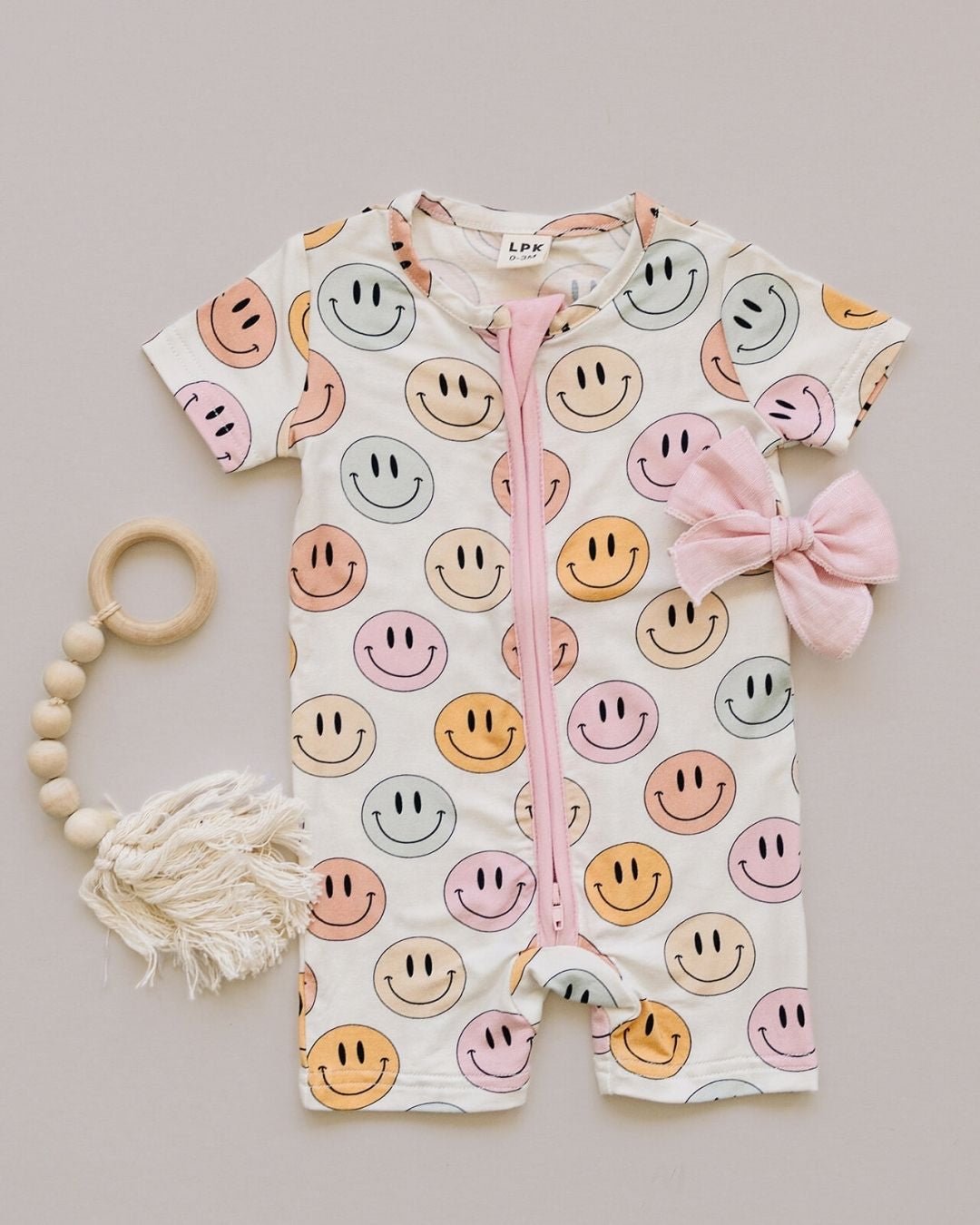 Bamboo Short Romper in Pink with an Adorable Smiley Print