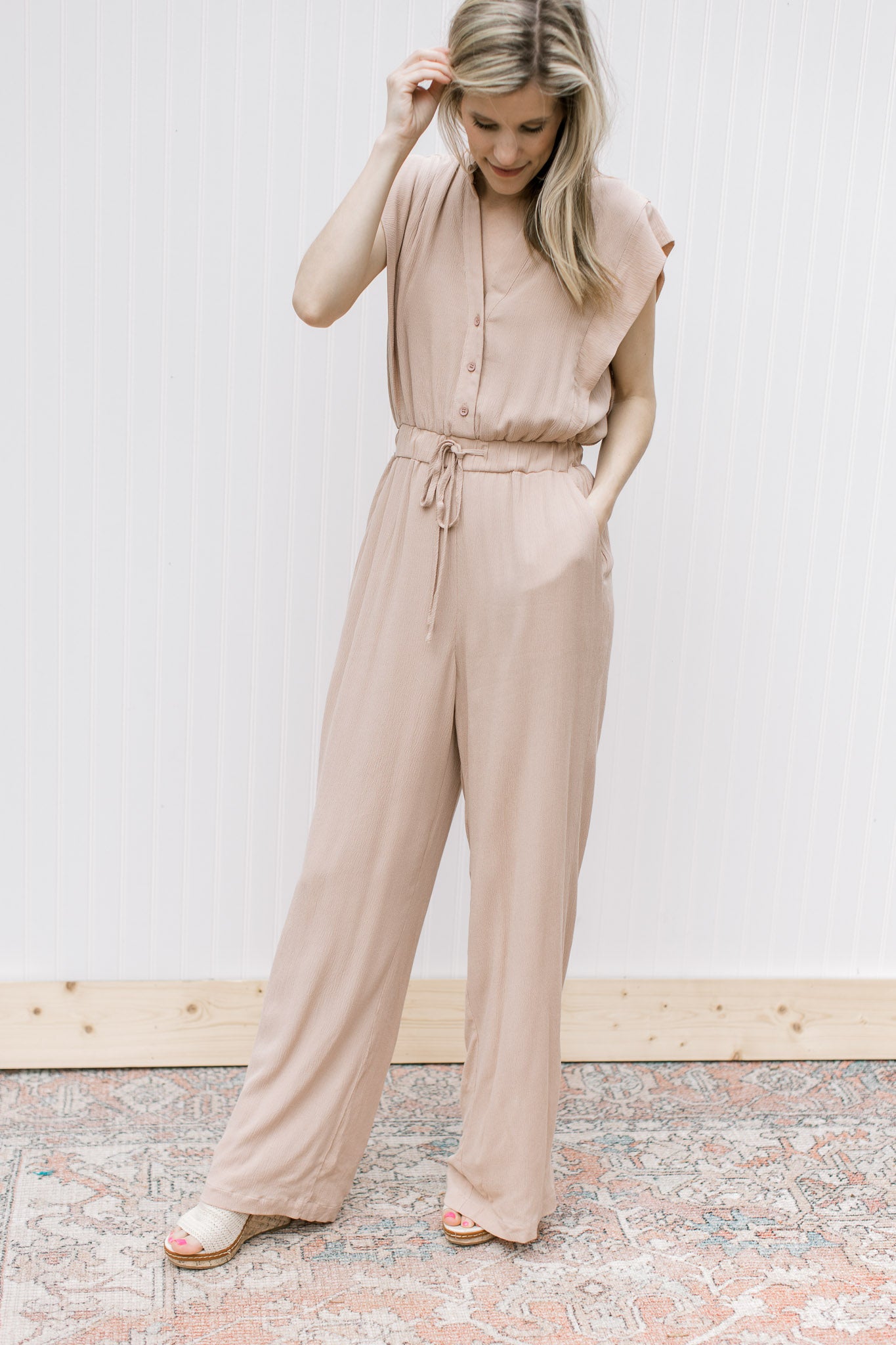 Beige Jumpsuit, stylish and versatile fashion piece for women. Available online now, shop the latest collection.