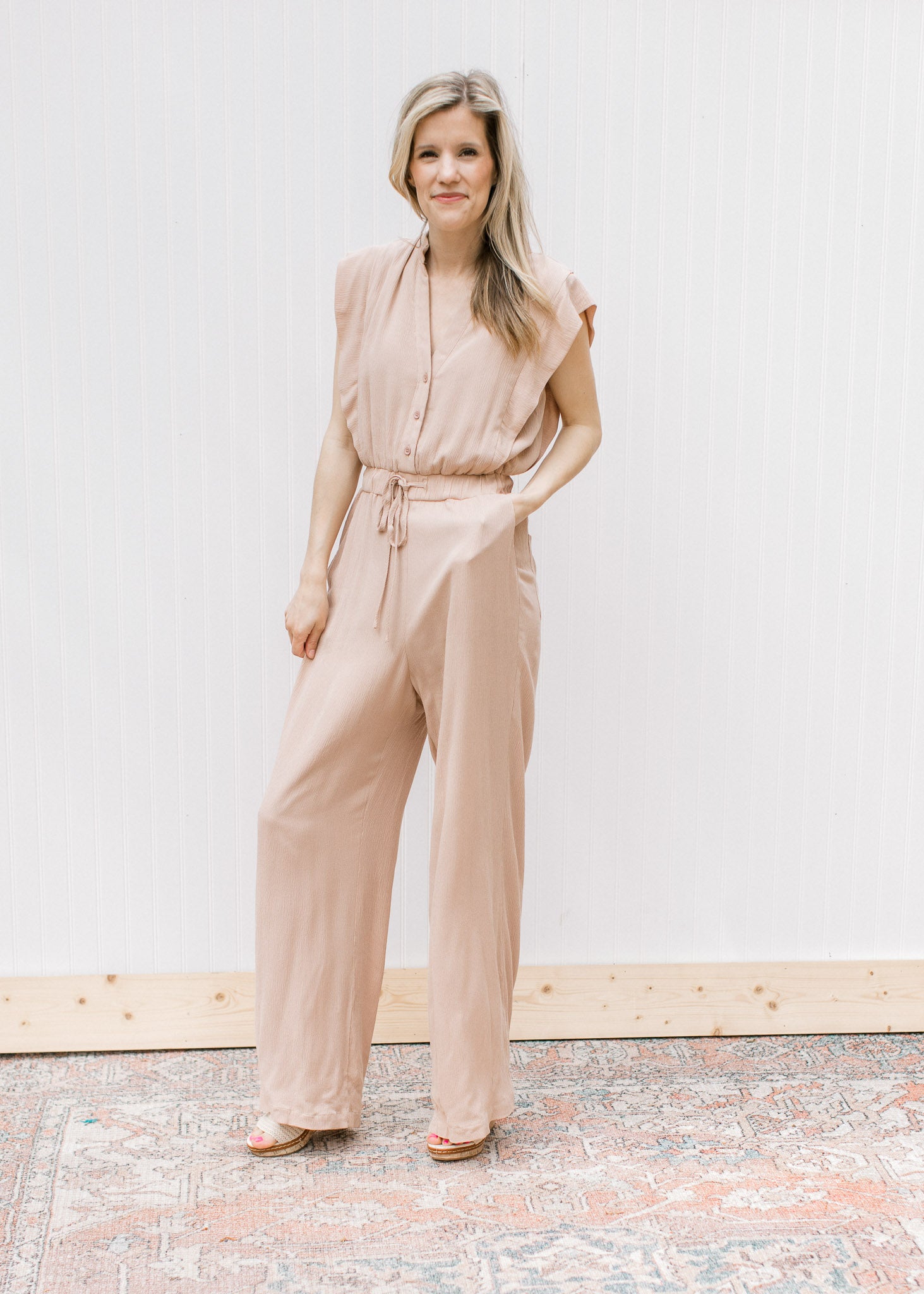 Beige Jumpsuit, stylish and versatile fashion piece for women. Available online now, shop the latest collection.