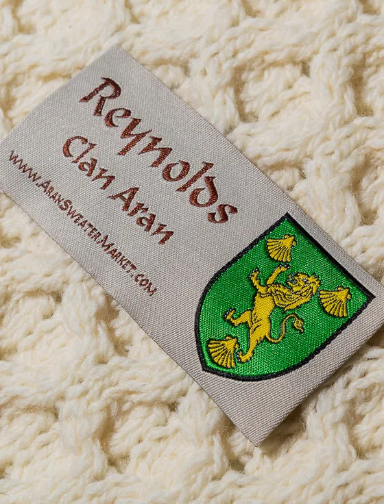 Reynolds Clan Scarf could be rewritten as Clan Scarf by Reynolds.